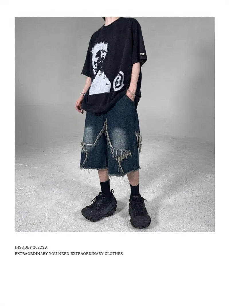 Blue denim shorts with frayed five-pointed star design and loose fit for summer casual wear