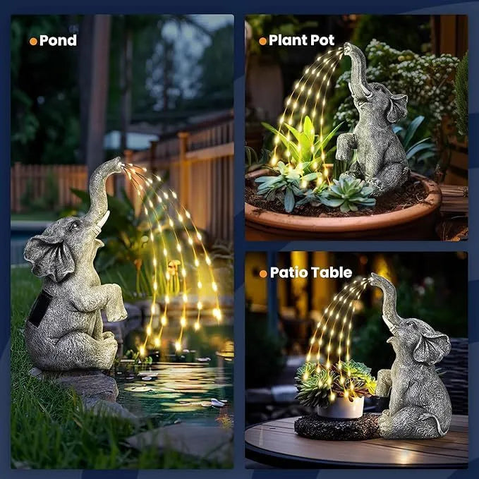 Resin elephant outdoor garden statue with integrated LED light strip.