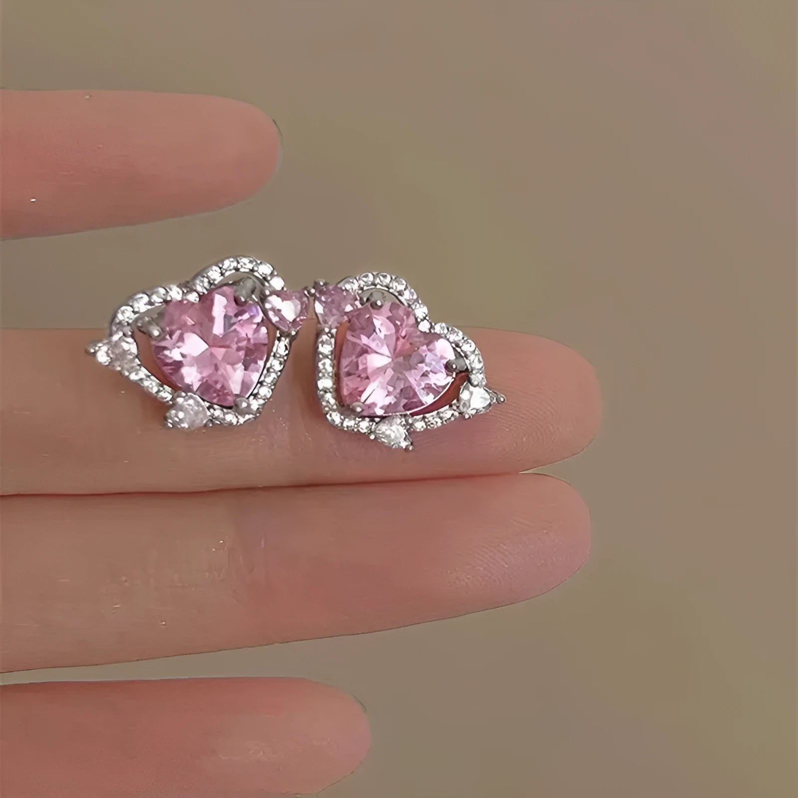White K colour heart-shaped copper stud earrings for women with electroplated finish