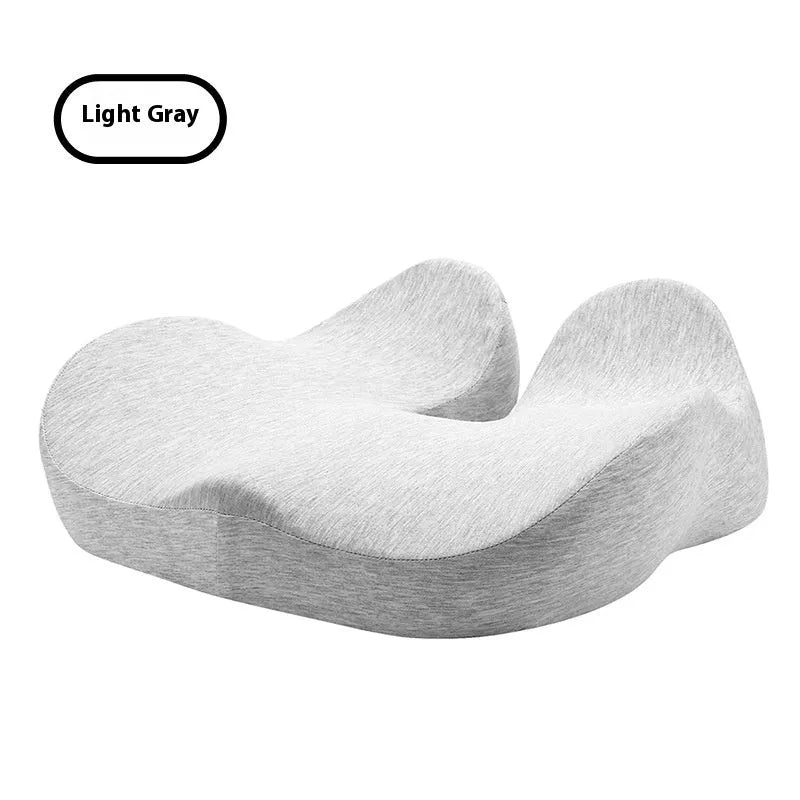 Grey memory foam office chair cushion measuring 46x43x12cm on a chair.