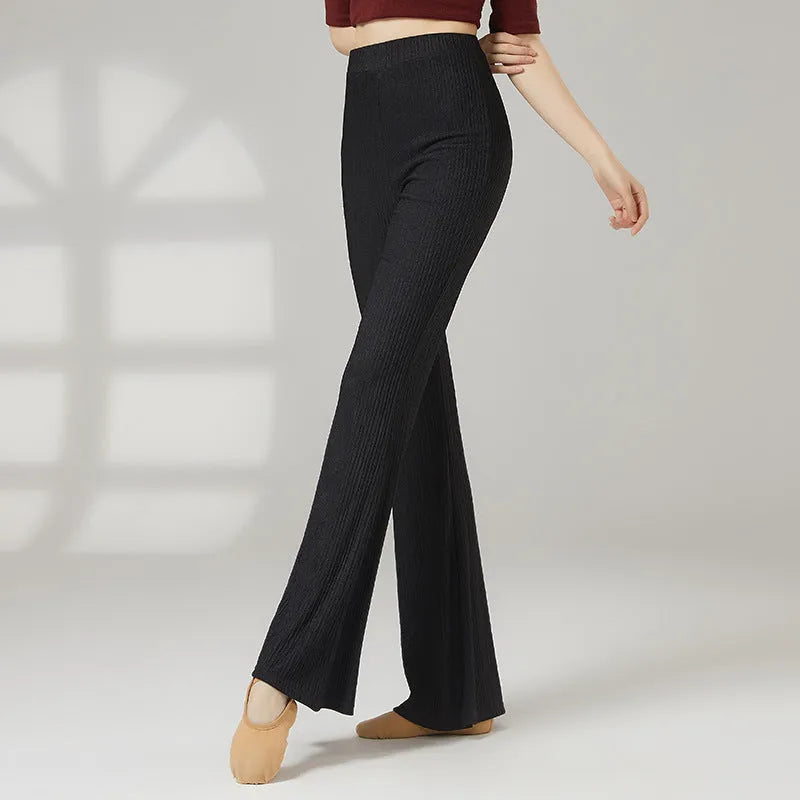 Adult female classical dance practice trousers in beige apricot, shown flat.