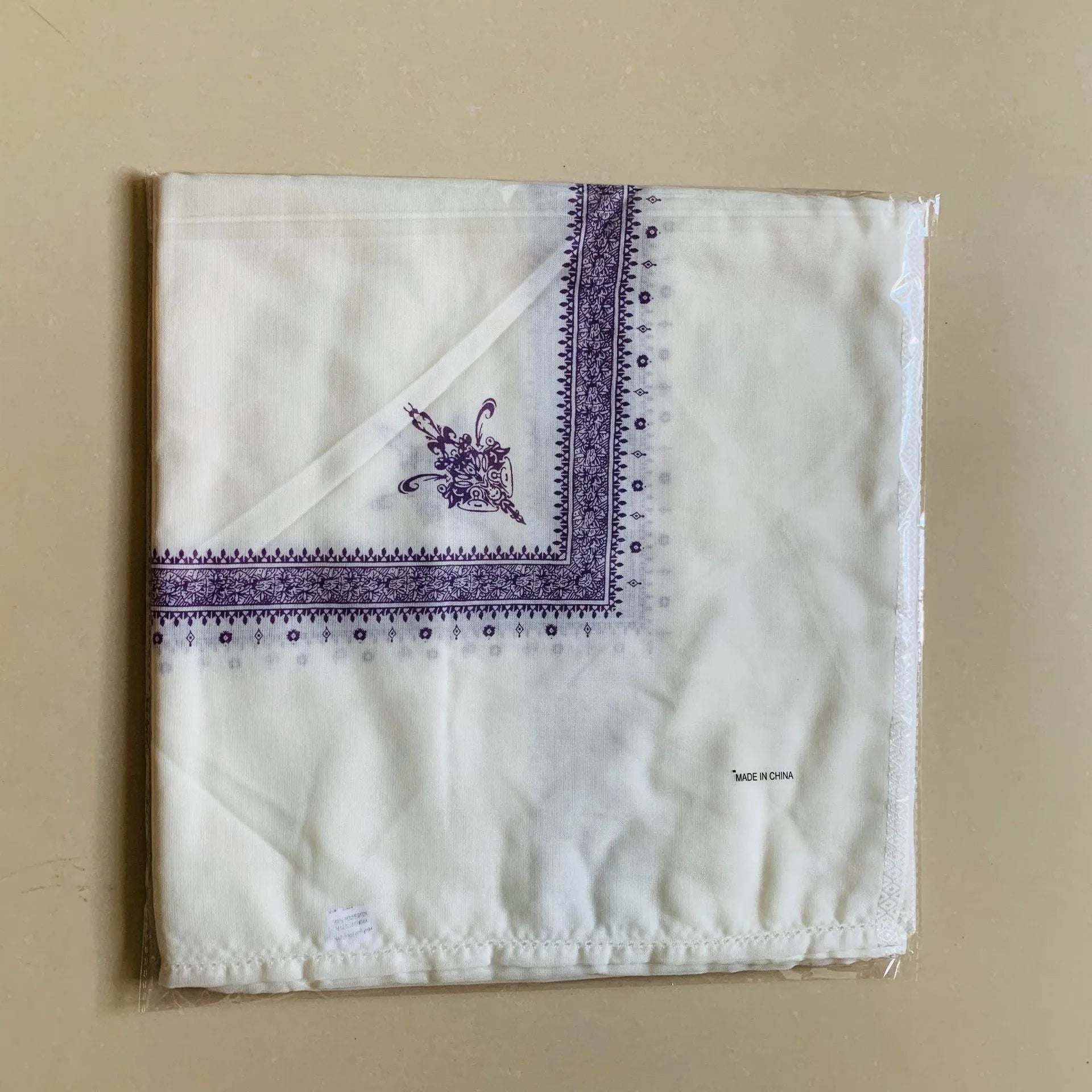 Printed square polyester scarf in six colour options measuring 138cm x 138cm