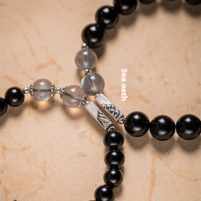 Obsidian Buddha beads couple bracelet set showing 8mm and 10mm stone beads in national style design