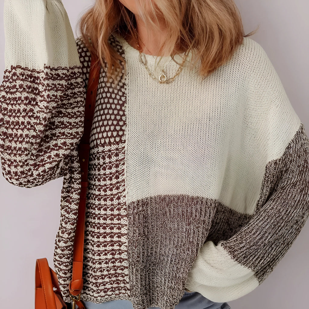 Dark khaki colour-block loose sweater with a back tie and drop shoulders on a hanger.