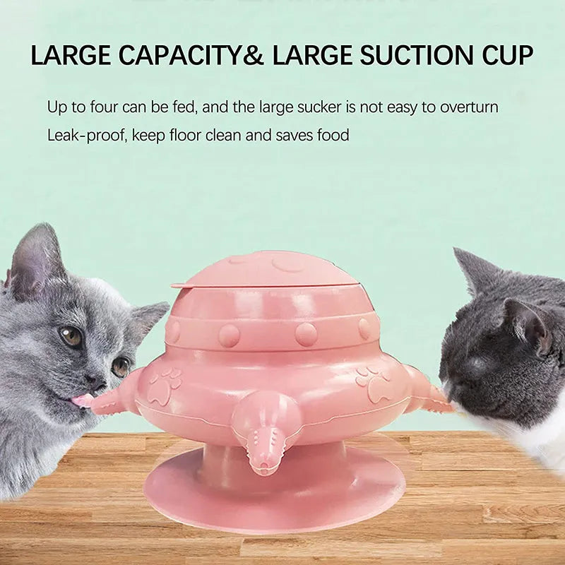 Pink silicone pet nursing device with pacifiers for feeding puppies and kittens.