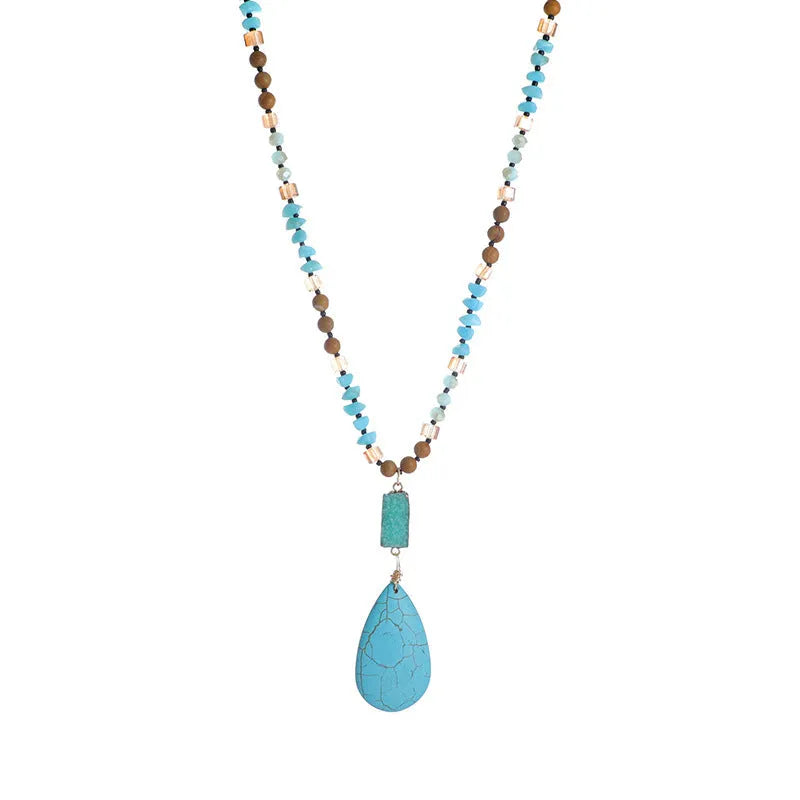 Blue turquoise imitation mineral necklace with large water drop pendant and ball bead chain.
