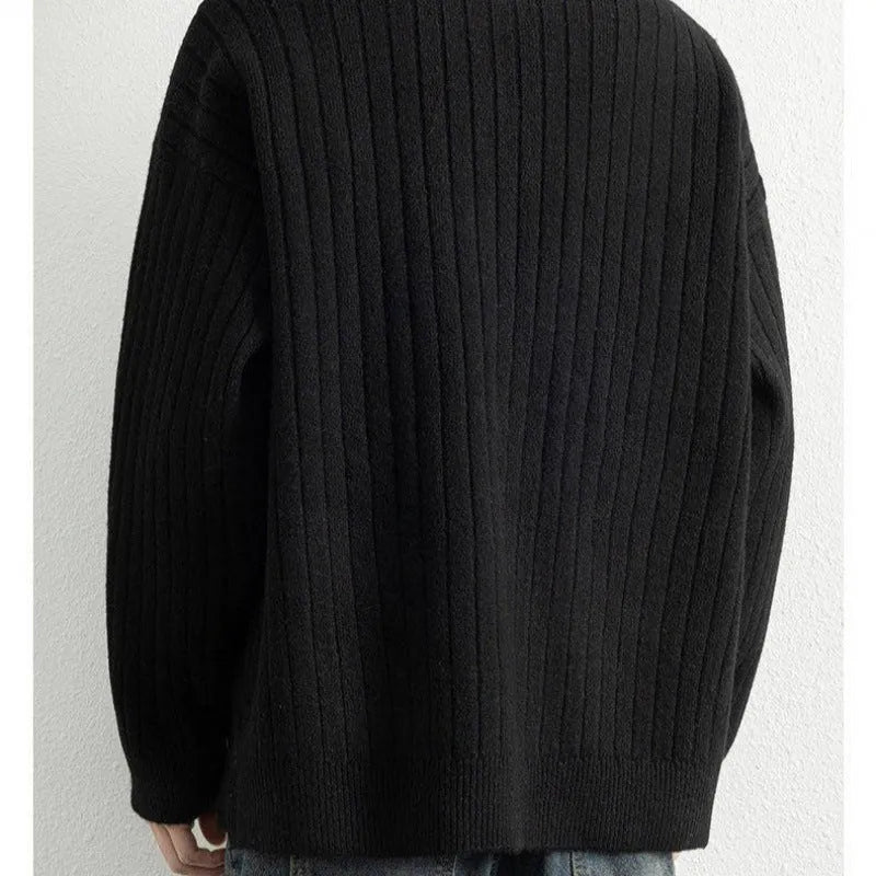 Grey men's loose fit half zip pullover sweater with textured knit and long sleeves.