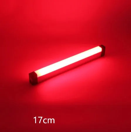 Blue and purple rechargeable LED tube stick light with dimmable settings.