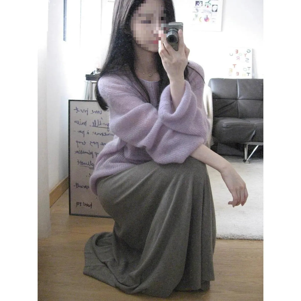Purple sleeveless women's blouse with hollow out detail and round neck, made from ice silk fabric.