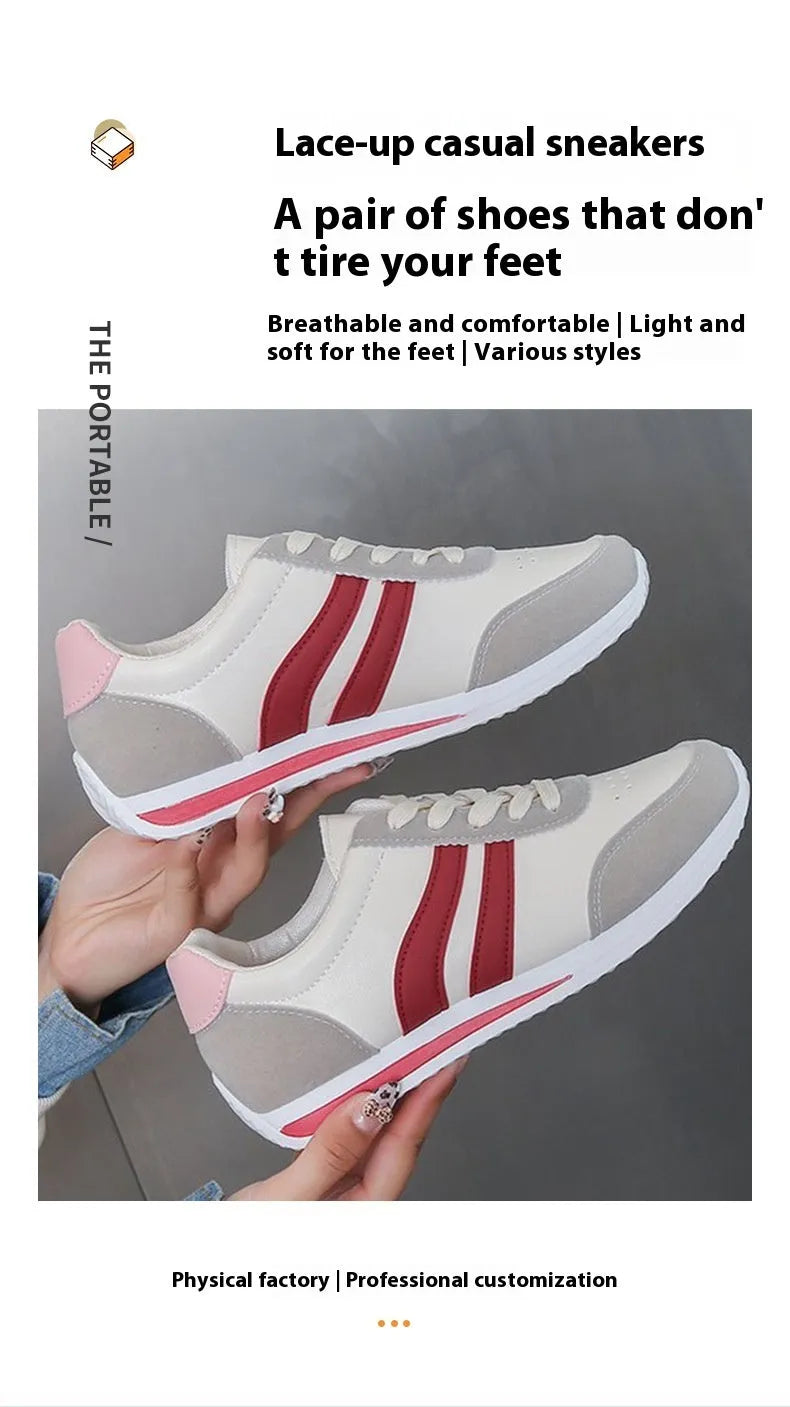 Blue and red low-top lace-up running sneakers with rubber soles and mesh upper