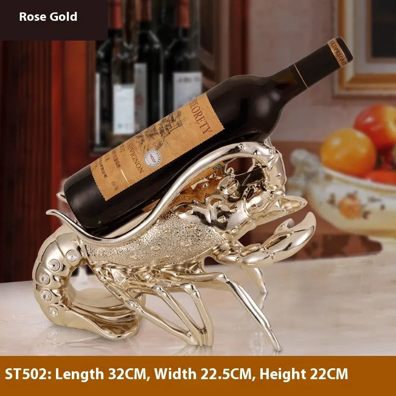 Lobster-shaped decorative wine rack ornament in rose gold or silver finish on a tabletop.