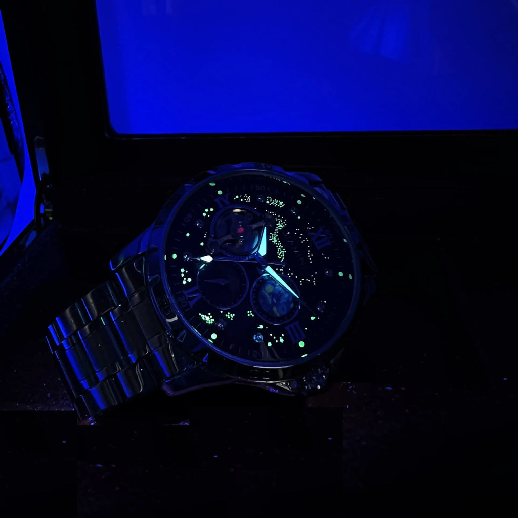 Men's automatic mechanical watch with rose gold case, black dial, and large display.