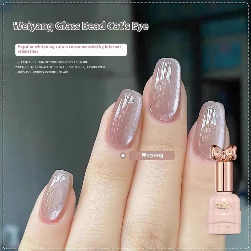 Bottle of micro glass bead cat's eye gel nail polish showing textured finish