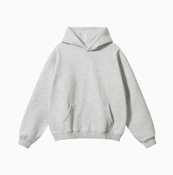 A loose-fitting men's cotton hooded sweater in a pullover style on a hanger.