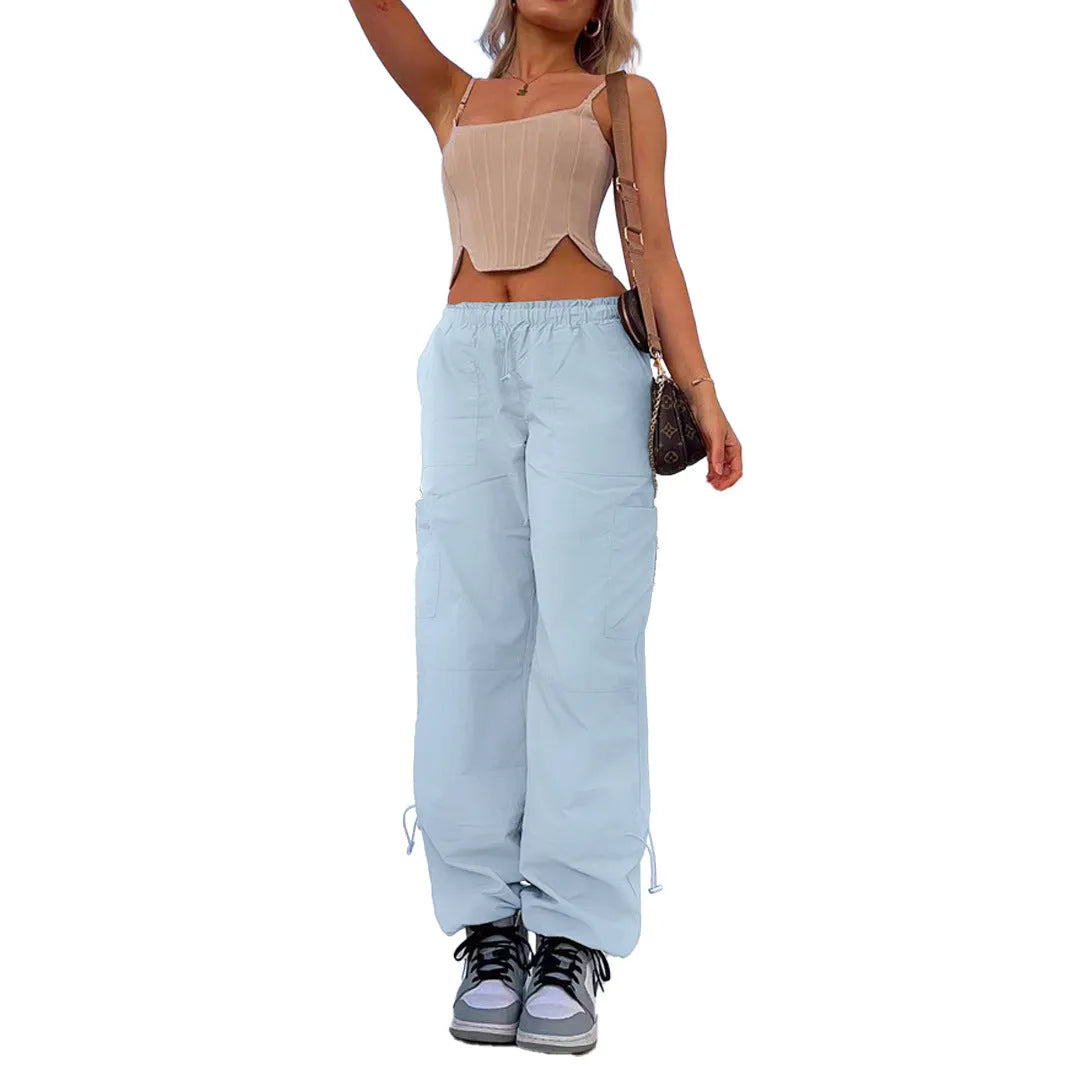 Straight-leg loose fit cargo casual pants in multiple colours on a mannequin, showing utility pockets.