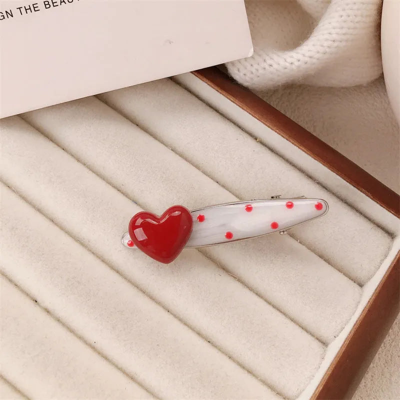 Red stereo love heart-shaped hairpin with French retro dots and willow leaf design