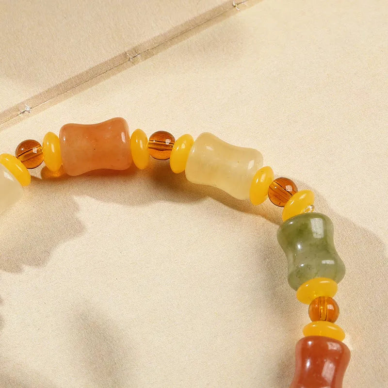 Natural Jinsi Jade small bone beads bracelet with geometric shape and auspicious patterns.
