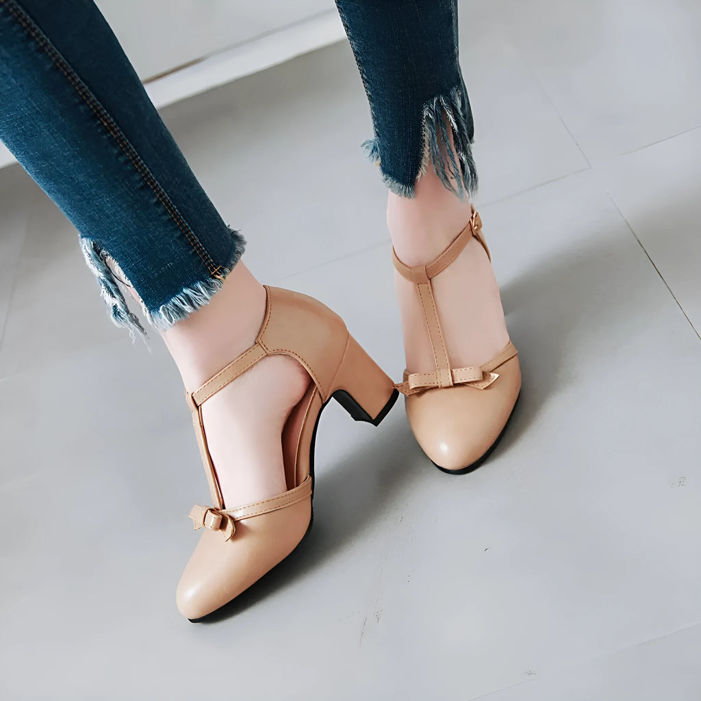 Women's apricot chunky heel sandals with an adjustable ankle strap and hollow-out design.