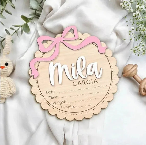 Square wooden baby room ornament with custom name engraving for nursery decor.