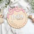 Square wooden baby room ornament with custom name engraving for nursery decor.