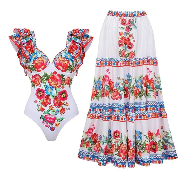 Women's floral printed one-piece polyester swimsuit on a hanger, showing skirted style.