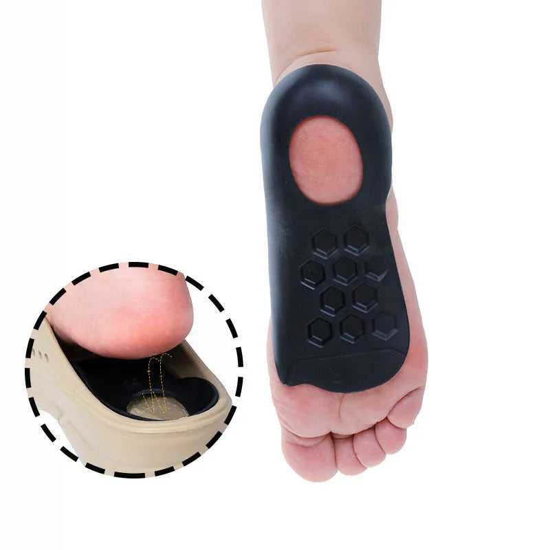 White arch support insole for varus foot correction on a grey background.