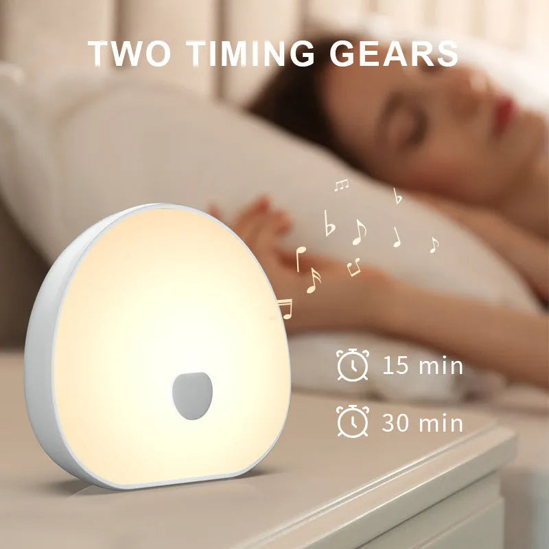 White rechargeable baby night feeding comforter with music function and included sleeper
