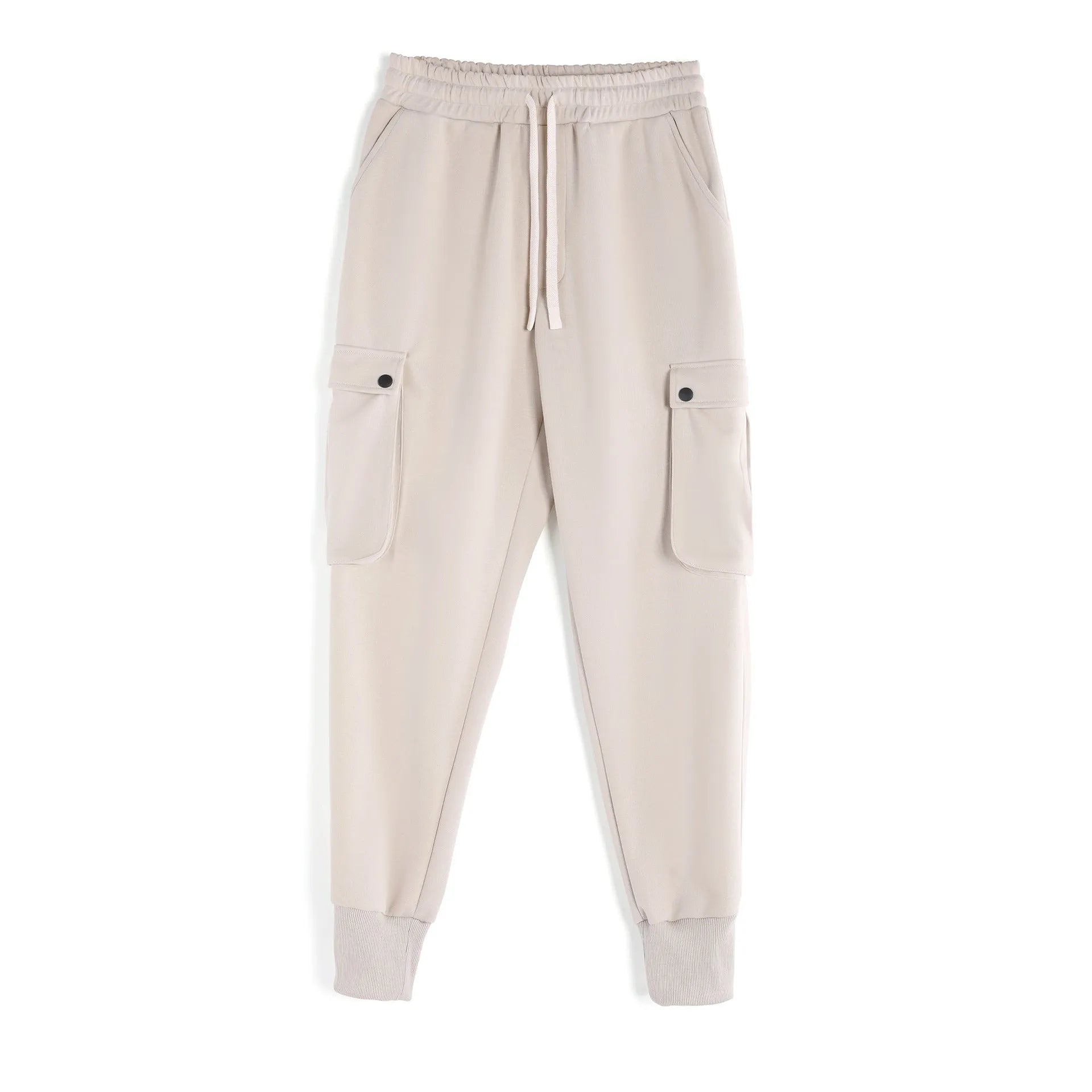 Men's loose-fit apricot coloured cotton sports trousers with an ankle tie and side pockets on a neutral background.
