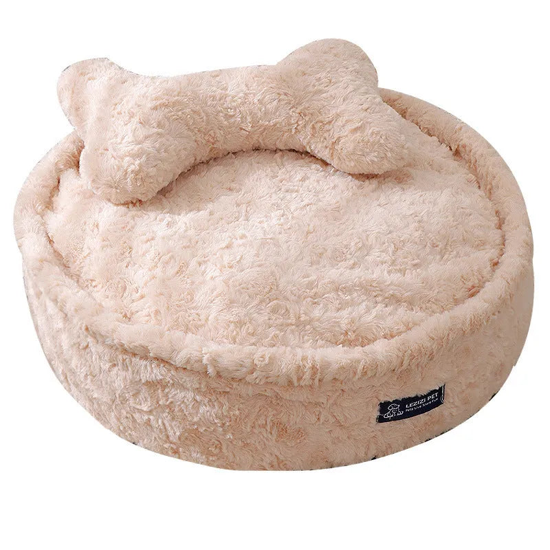 Small milk tea coloured fabric dog kennel with a round nest design on a wooden floor.
