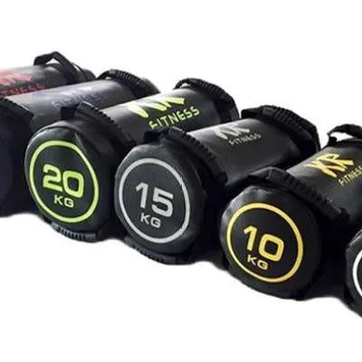 Flat white PVC fitness training sandbag for weight lifting on a gym floor.