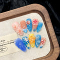 3D carved jellyfish plastic wearable armour set in almond nail colour with rose and tulip patterns