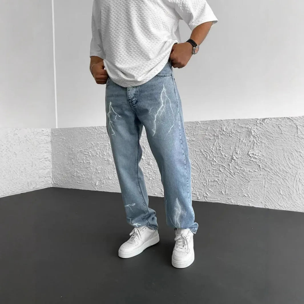 Men's blue straight-leg denim trousers with mid waist and zipper fly closure