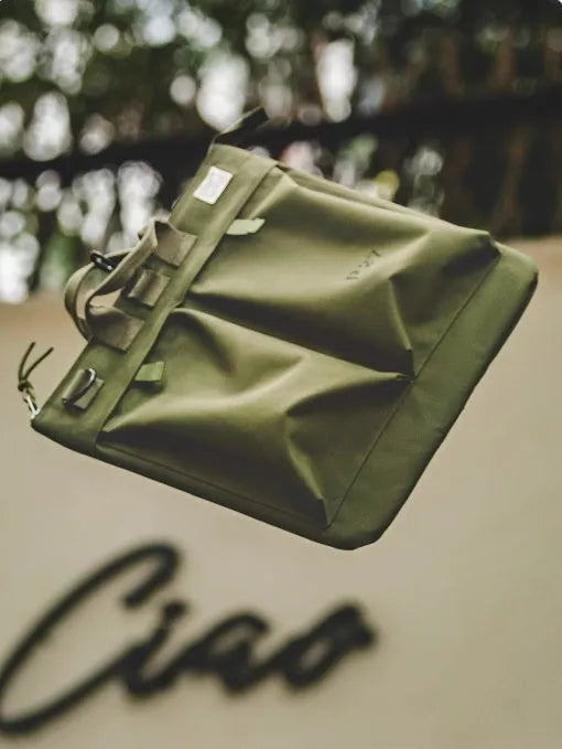 Marden Tooling medium canvas messenger bag in military green with crossbody strap and hard handle