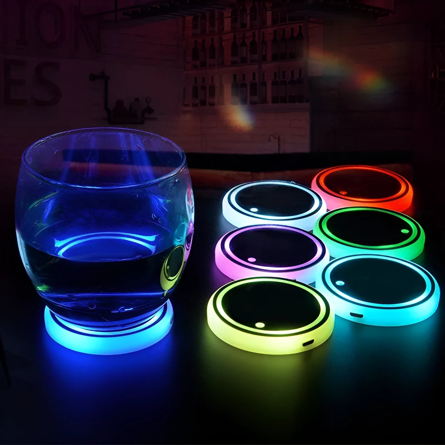 Colourful LED light-up coaster for car cup holder with non-slip surface and USB cable.