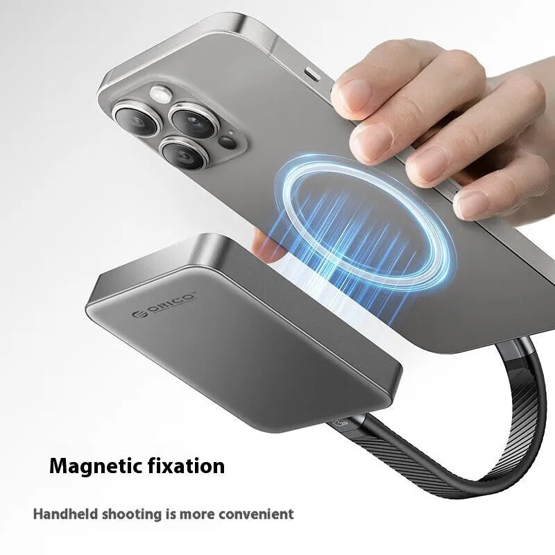 Grey magnetic mobile external SSD for phones and computers with a C to C cable and magnetic ring.