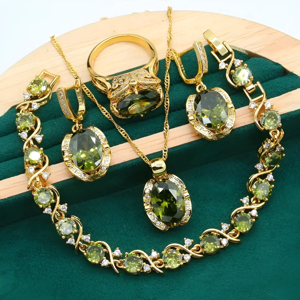 Olive green women's rhinestone jewellery suit with snake bones chain necklace, earrings, and ring on copper.