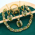 Olive green women's rhinestone jewellery suit with snake bones chain necklace, earrings, and ring on copper.