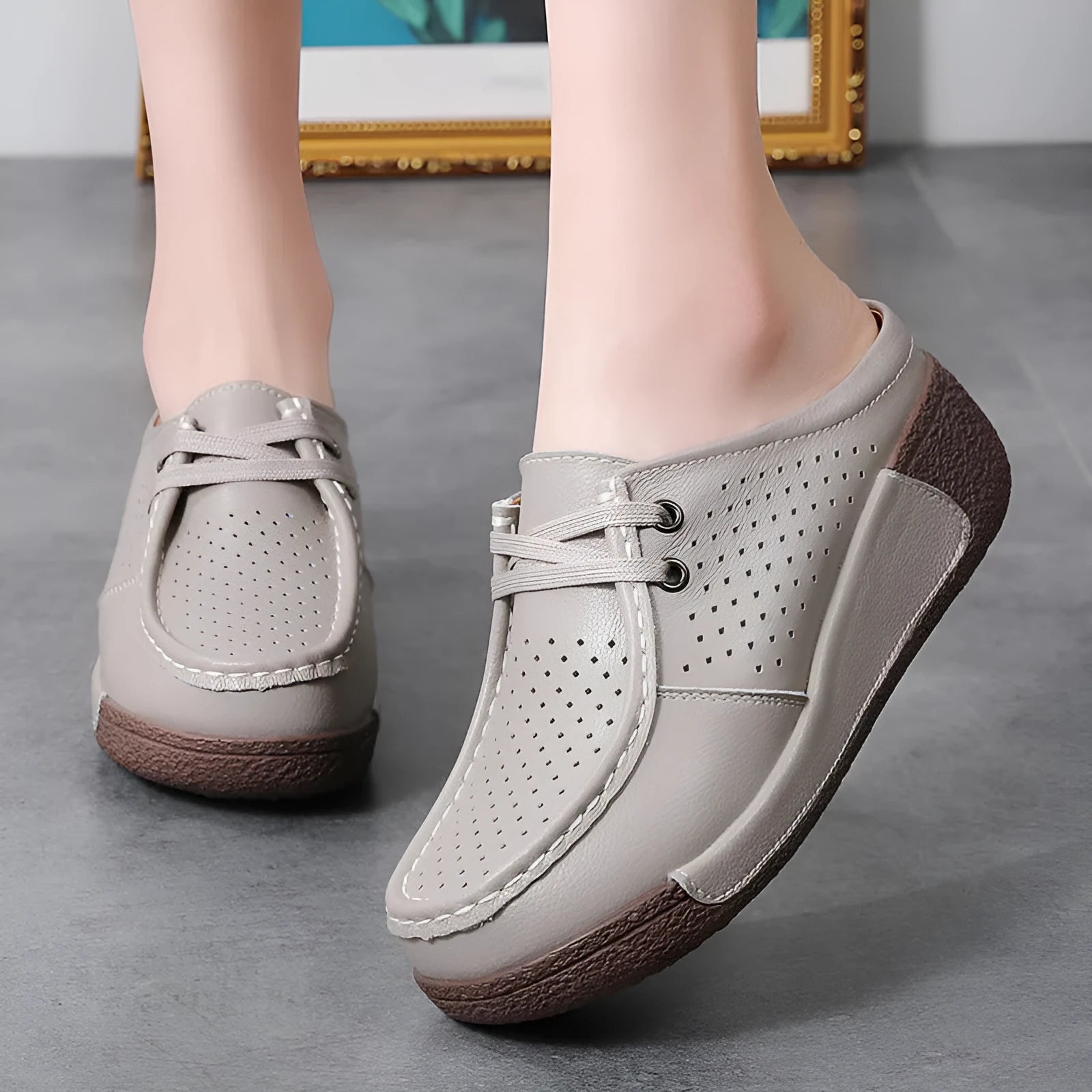 Plus size women's genuine leather platform slippers in black with round toe and hollow-out wedge sole
