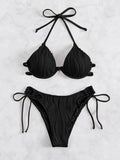 Women's black bikini swimsuit with steel bracket underwire on a mannequin.