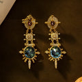Gold retro geometric stud earrings with round design and diamond-treatment finish