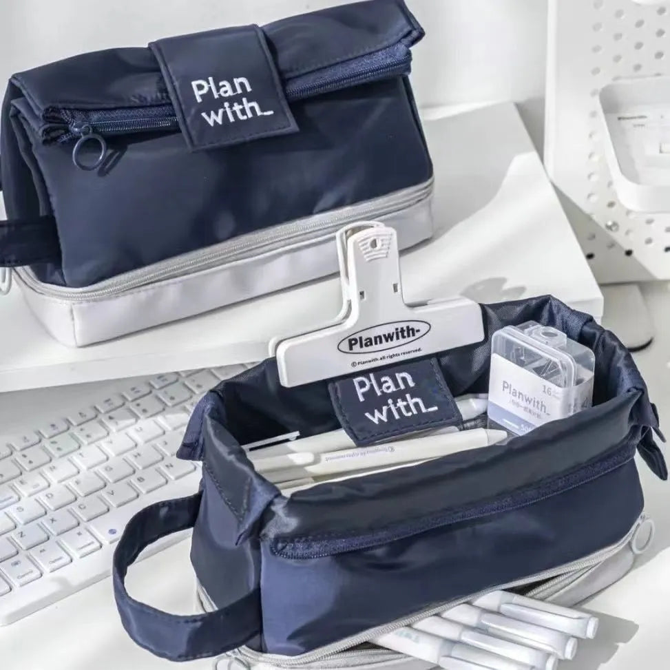 Folding double layer student pencil case in blue, navy blue, and cream white colours