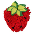 Red and green strawberry-shaped pet snuffle mat with hiding spots for interactive feeding