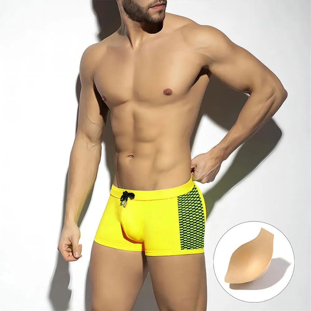 Men's polka dot print quick-dry swimming boxers in black, dark blue, or yellow with ribbon cup detail