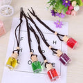 Glass bottle car air freshener hanging ornament with six fragrance refill options displayed