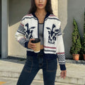 White women's zip cardigan with jacquard lapel and contrast stripe pattern