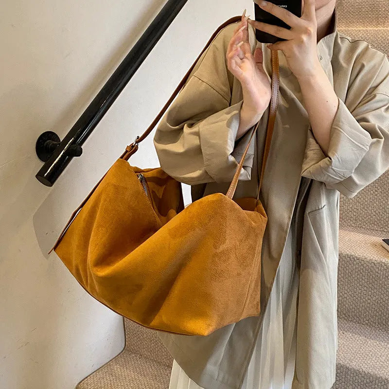 Women's large capacity suede-look PU pillow shoulder bag with outer slit pocket in black, brown, coffee, or khaki