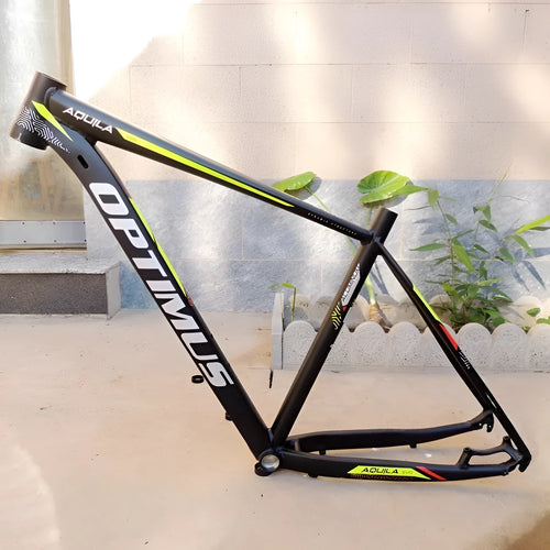 Black green 29-inch aluminium mountain bike frame with disc brake mounts and internal cable routing ports.