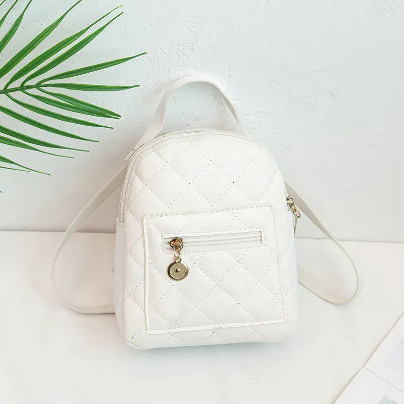 Hard shell white Korean style embroidered girls backpack with soft handle on a square background.
