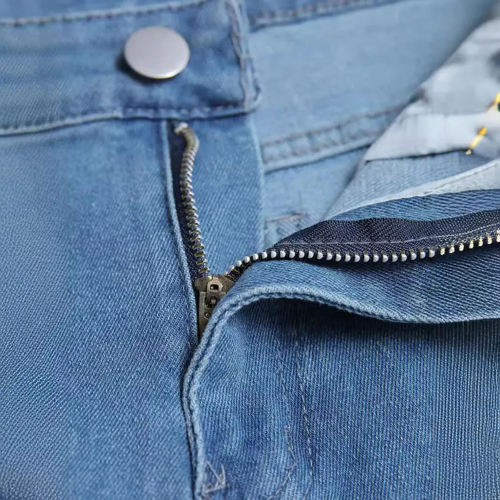 Men's blue cotton denim skinny jeans with medium elasticity, available in sizes S to XXL.
