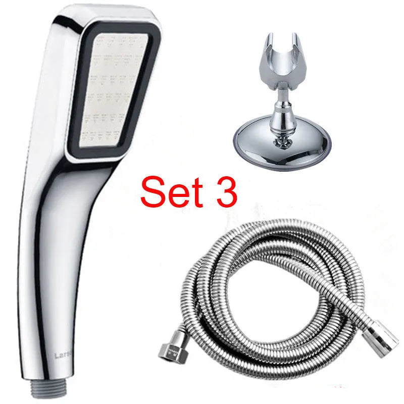 Orange hand-held pressurised shower head with rain spray function